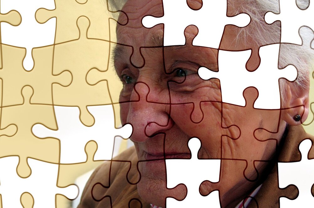 Older adult with missing puzzle pieces